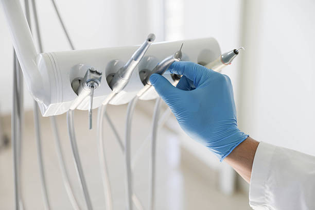Professional Tooth Extraction technician working in Greenlawn, NY